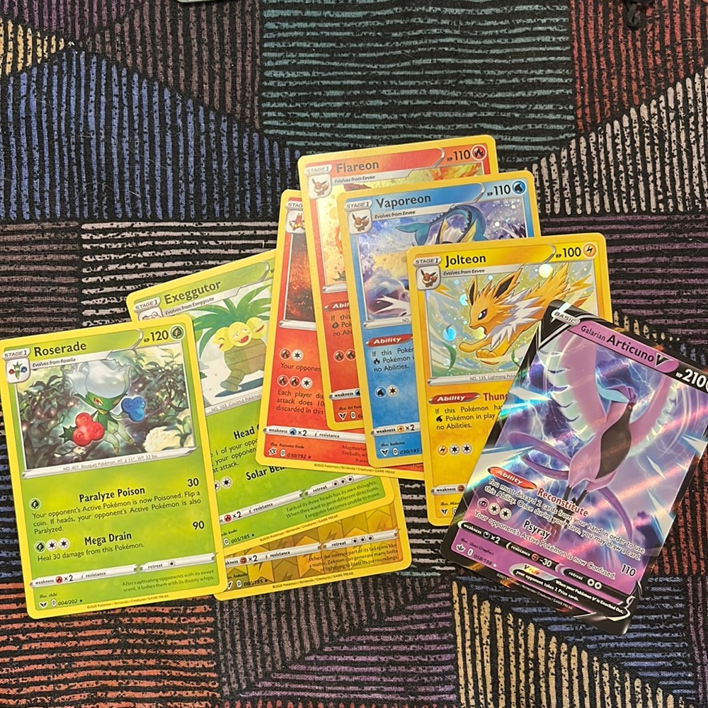 50+ Pokémon cards including the ones pictured